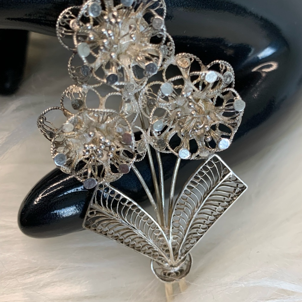 Intricate Silver Floral Brooch with Filigree Design